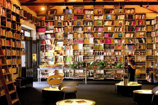 A man at the cafe in the book hotel in Portugal