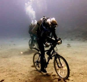 Underwater cycling while scuba diving